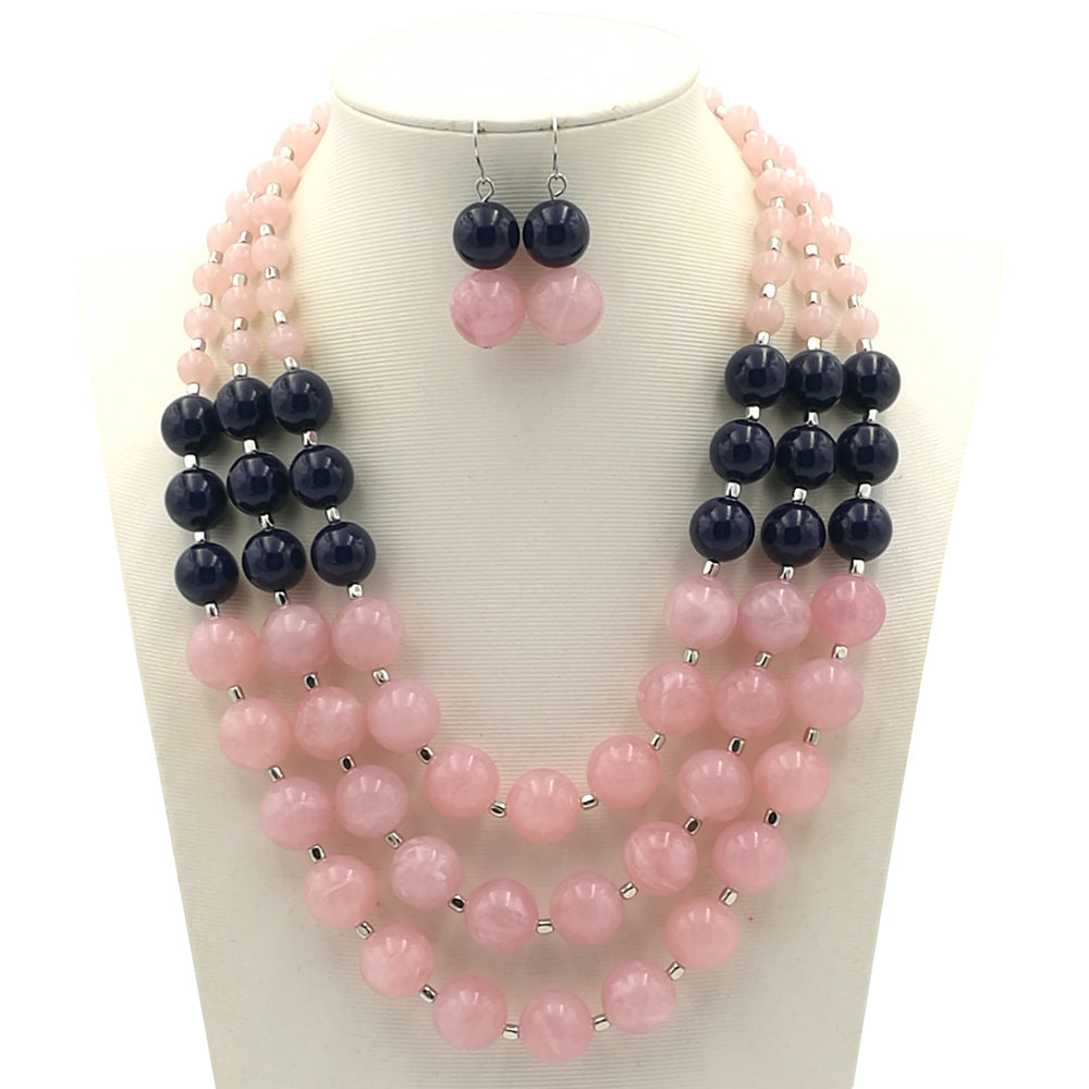 Venta al por mayor de plástico multicapa exagerada pendientes collar conjunto de joyas